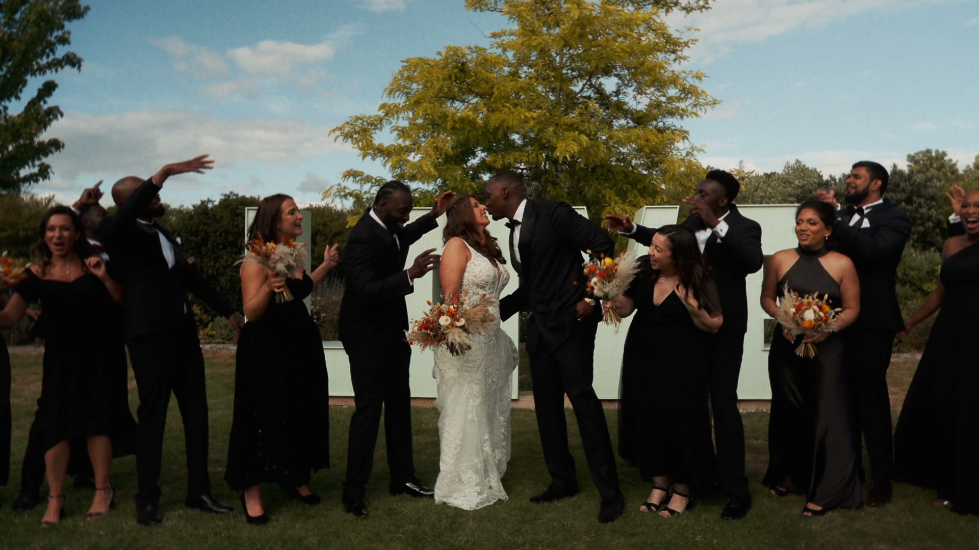 A couple laughing together on their wedding day